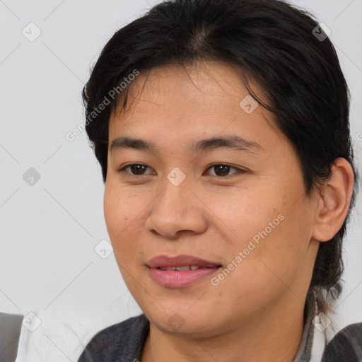 Joyful asian young-adult female with medium  brown hair and brown eyes