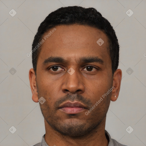 Neutral latino young-adult male with short  black hair and brown eyes