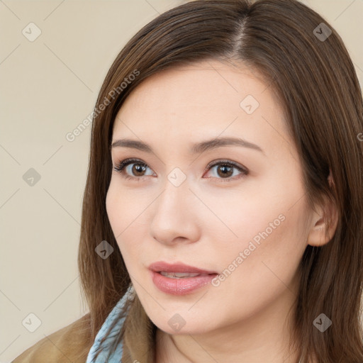 Neutral white young-adult female with long  brown hair and brown eyes