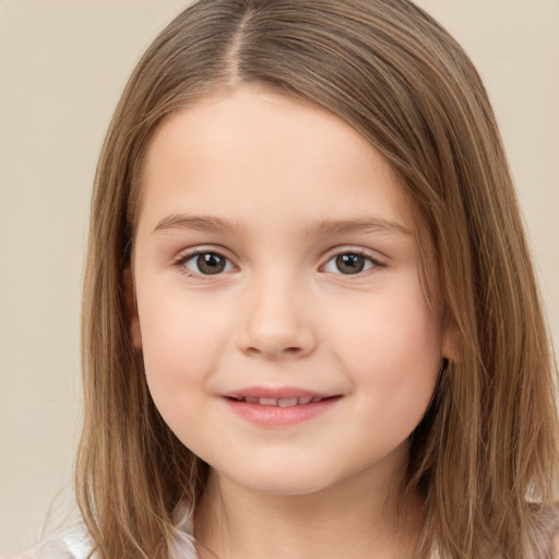 Joyful white child female with long  brown hair and brown eyes