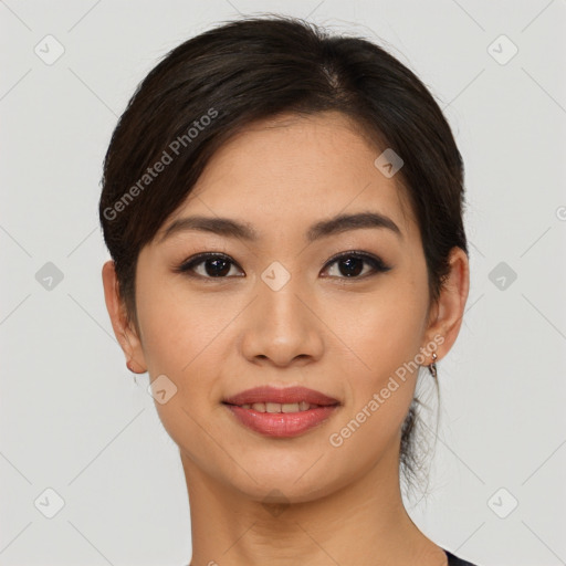 Joyful asian young-adult female with short  brown hair and brown eyes