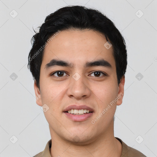 Joyful asian young-adult male with short  black hair and brown eyes