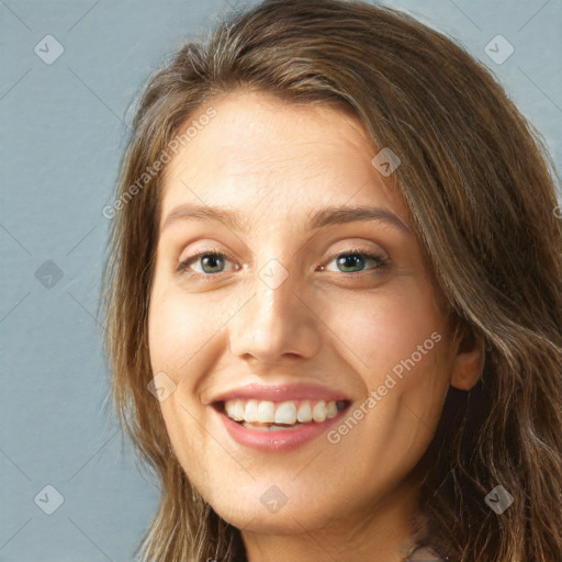 Joyful white young-adult female with long  brown hair and green eyes