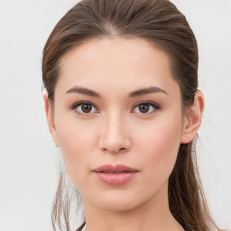 Neutral white young-adult female with long  brown hair and brown eyes