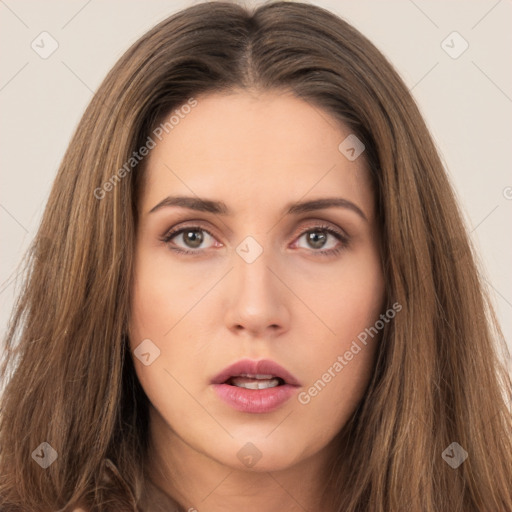 Neutral white young-adult female with long  brown hair and brown eyes