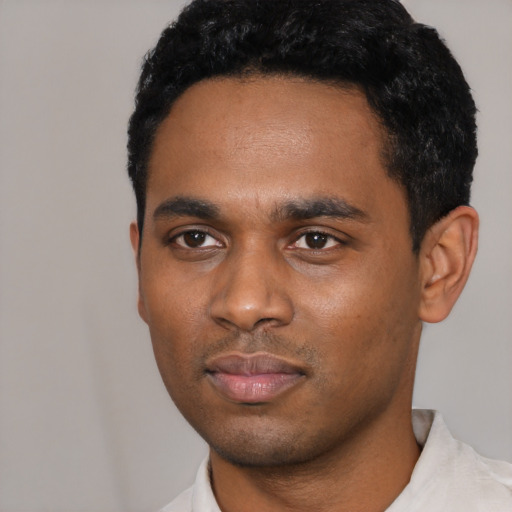 Neutral black young-adult male with short  black hair and brown eyes