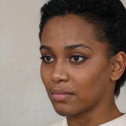 Neutral black young-adult female with short  brown hair and brown eyes