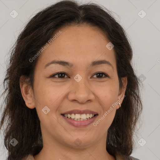 Joyful white adult female with medium  brown hair and brown eyes