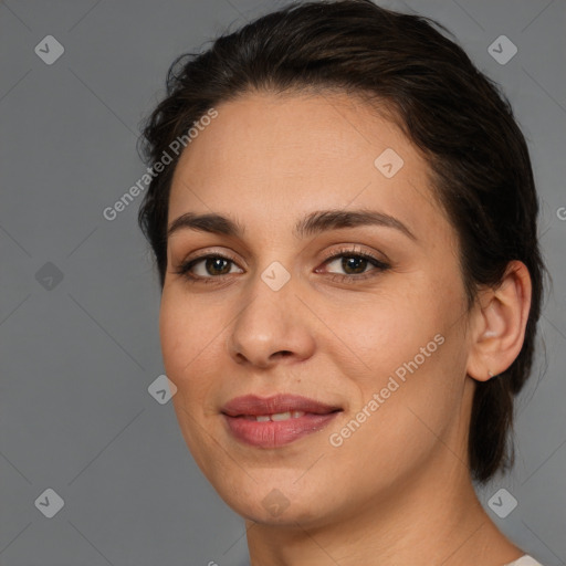 Joyful white young-adult female with medium  brown hair and brown eyes