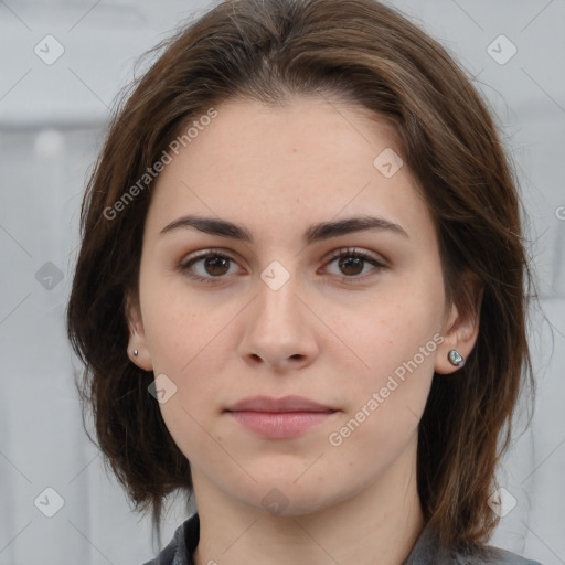 Neutral white young-adult female with medium  brown hair and brown eyes