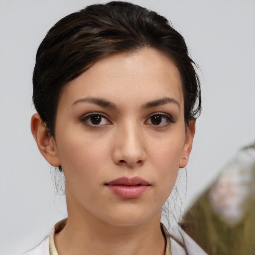 Neutral white young-adult female with short  brown hair and brown eyes