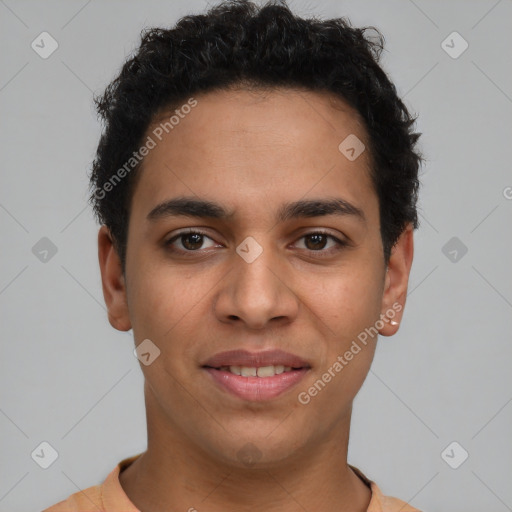 Joyful latino young-adult male with short  brown hair and brown eyes