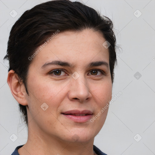 Joyful white adult female with short  brown hair and brown eyes