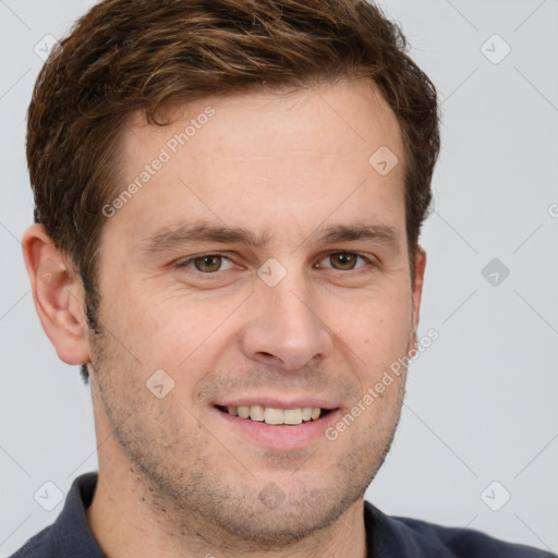 Joyful white adult male with short  brown hair and grey eyes