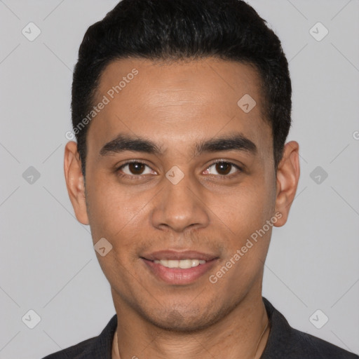 Joyful white young-adult male with short  black hair and brown eyes