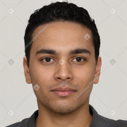 Neutral latino young-adult male with short  black hair and brown eyes