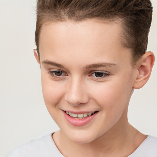 Joyful white child female with short  brown hair and brown eyes