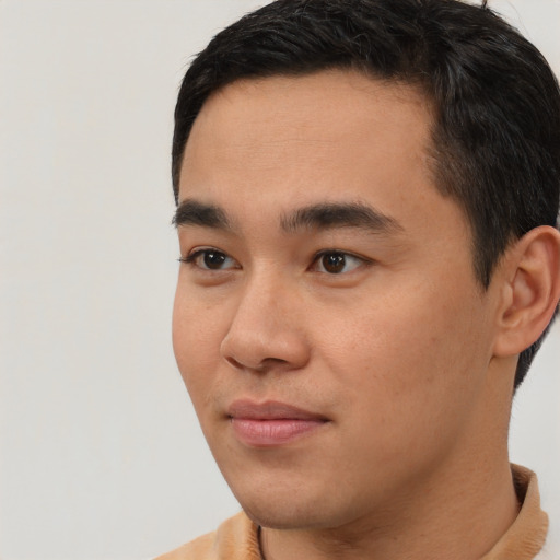 Neutral asian young-adult male with short  black hair and brown eyes
