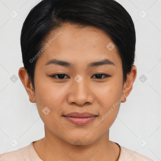 Joyful asian young-adult female with short  black hair and brown eyes