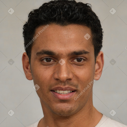 Joyful white young-adult male with short  black hair and brown eyes