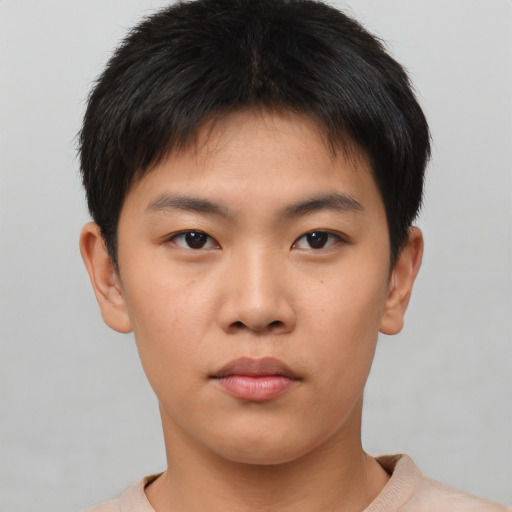 Neutral asian young-adult male with short  brown hair and brown eyes