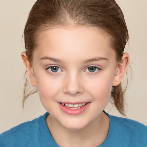 Joyful white child female with medium  brown hair and brown eyes