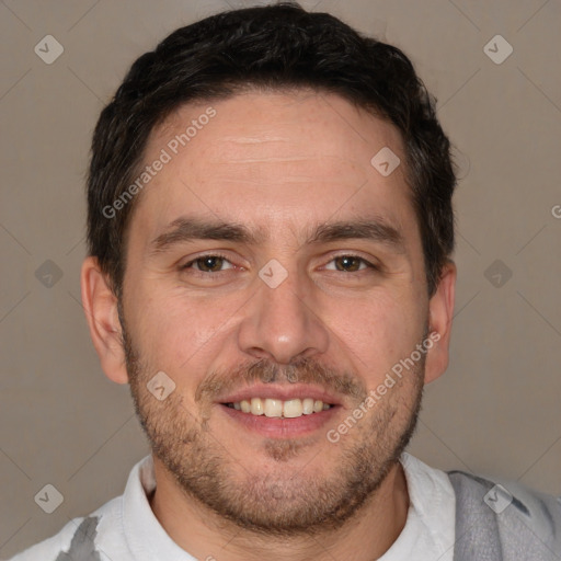 Joyful white adult male with short  brown hair and brown eyes