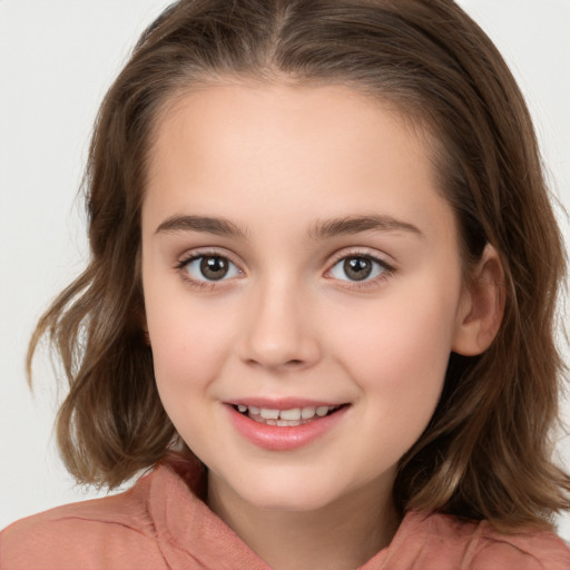 Joyful white child female with medium  brown hair and brown eyes