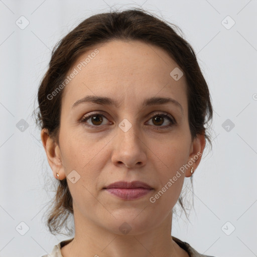 Joyful white adult female with short  brown hair and grey eyes