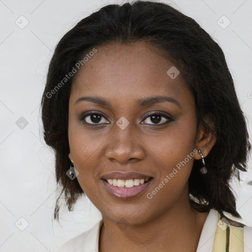 Joyful black young-adult female with medium  brown hair and brown eyes