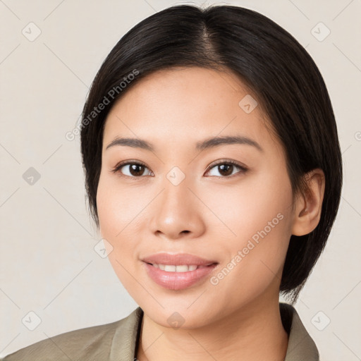 Joyful asian young-adult female with medium  brown hair and brown eyes