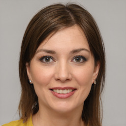 Joyful white young-adult female with medium  brown hair and brown eyes