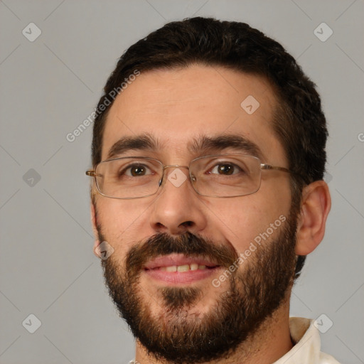 Joyful white adult male with short  brown hair and brown eyes