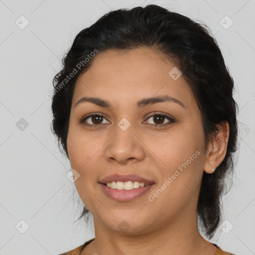 Joyful latino young-adult female with medium  brown hair and brown eyes