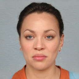 Neutral white young-adult female with short  brown hair and brown eyes