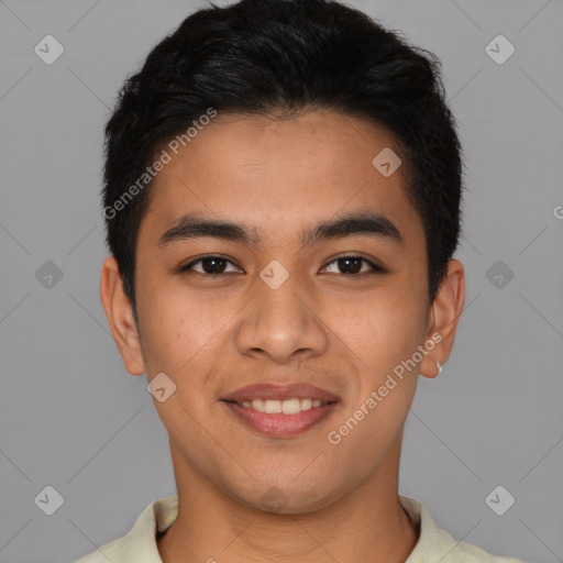 Joyful latino young-adult male with short  black hair and brown eyes