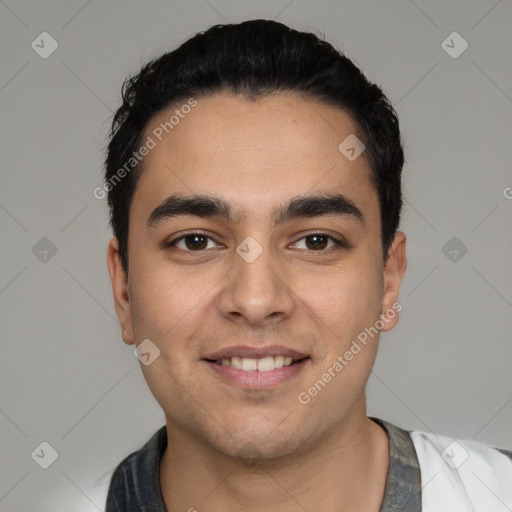 Joyful white young-adult male with short  black hair and brown eyes