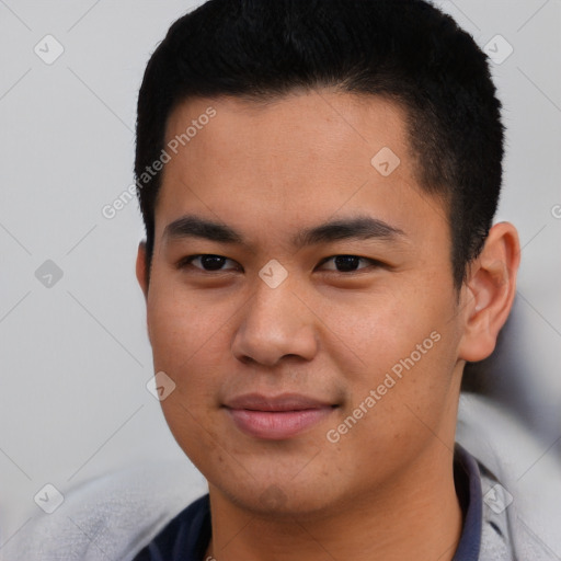 Joyful asian young-adult male with short  black hair and brown eyes