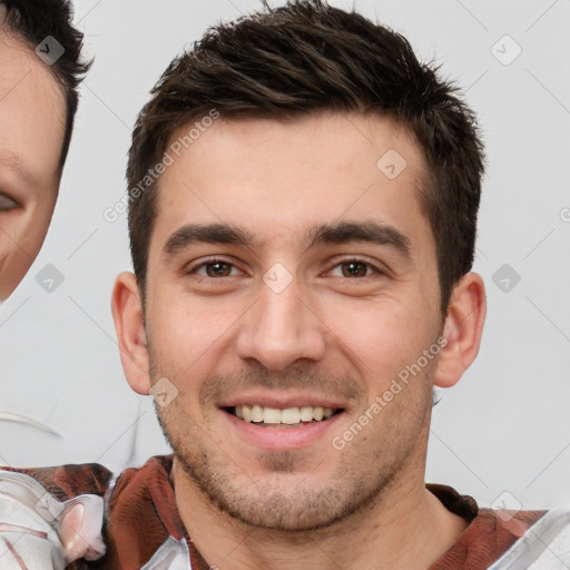 Joyful white young-adult male with short  brown hair and brown eyes