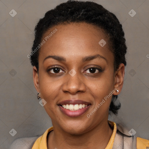 Joyful black young-adult female with short  brown hair and brown eyes