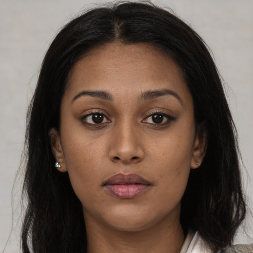 Neutral asian young-adult female with long  brown hair and brown eyes