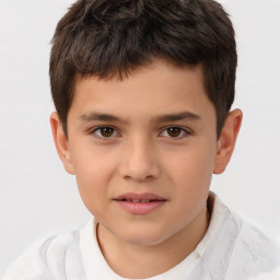 Joyful white child male with short  brown hair and brown eyes