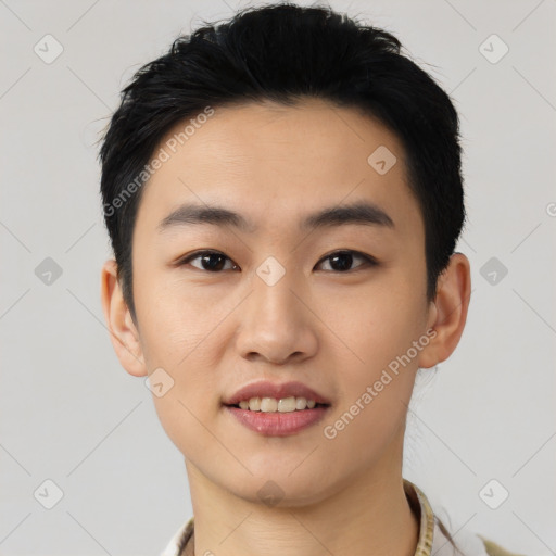 Joyful asian young-adult male with short  black hair and brown eyes