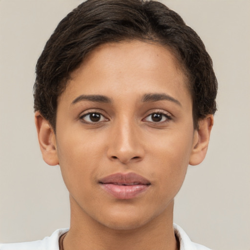 Joyful white young-adult female with short  brown hair and brown eyes