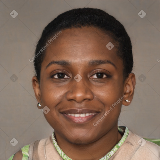 Joyful black young-adult female with short  brown hair and brown eyes