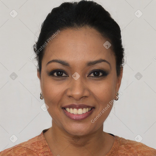 Joyful latino young-adult female with short  black hair and brown eyes