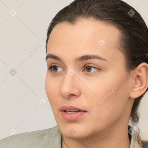 Neutral white young-adult female with medium  brown hair and brown eyes