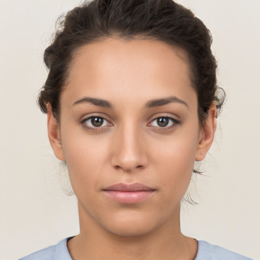 Neutral white young-adult female with short  brown hair and brown eyes