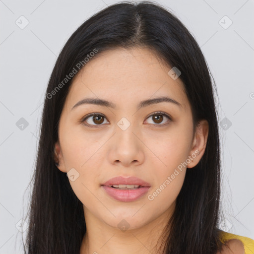 Joyful asian young-adult female with long  brown hair and brown eyes