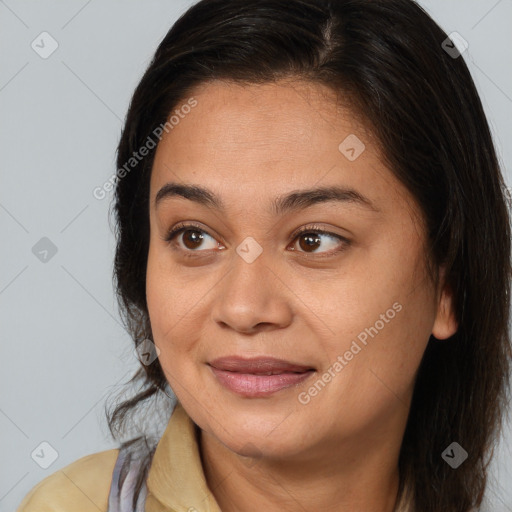 Joyful black young-adult female with medium  brown hair and brown eyes